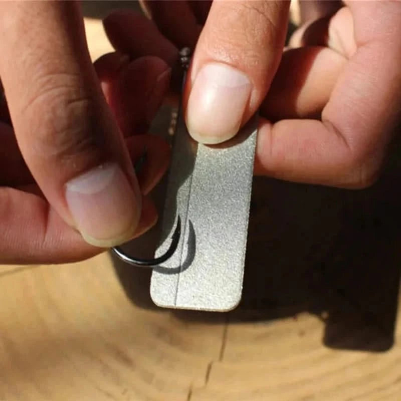 Mini afilador de bolsillo con llavero – piedra diamantada para cuchillos y anzuelos